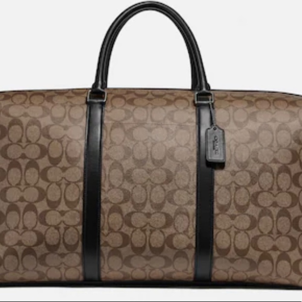 COACH “Trekker 52 Bag” has become a staple for ANY world traveler! M or F!